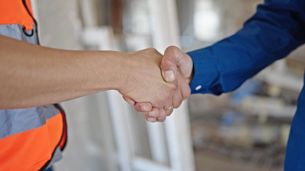 electrical contractor shaking hands with a Prescott Valley, AZ Homeowner