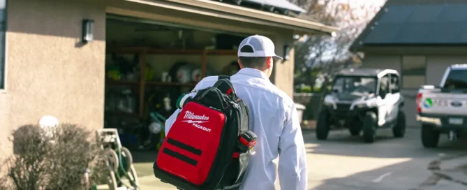 Electrician arrives at the house with a tool bag to inspect electrical problems in older homes
