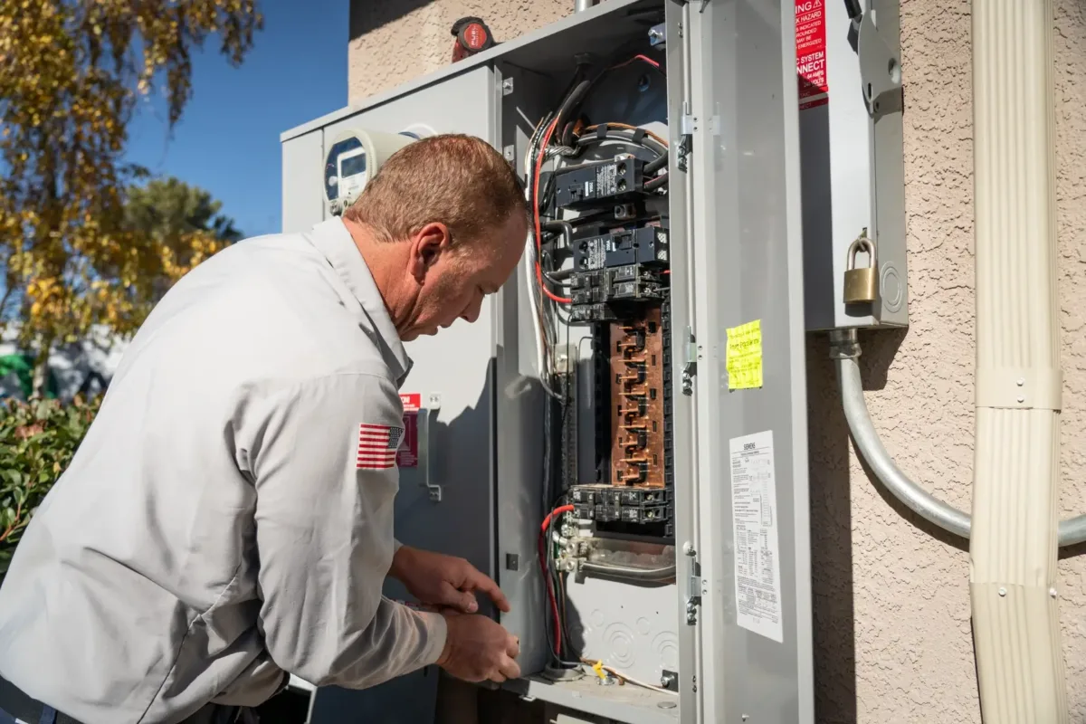 The technician tests the breaker panel with a multimeter. How does an electrical panel work in homes?