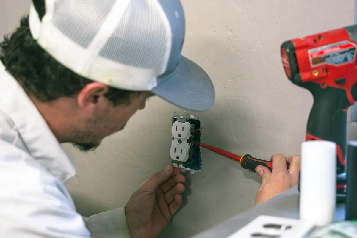 what-is-gfci-and-why-is-it-important-gfci-outlet GFCI outlet with Test/Reset buttons and wiring caps; what is GFCI, and why is it important?